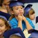 A Safety Town student makes a face during graduation ceremony at Dicken Elementary School on Friday, July, 26, 2013. Melanie Maxwell | AnnArbor.com